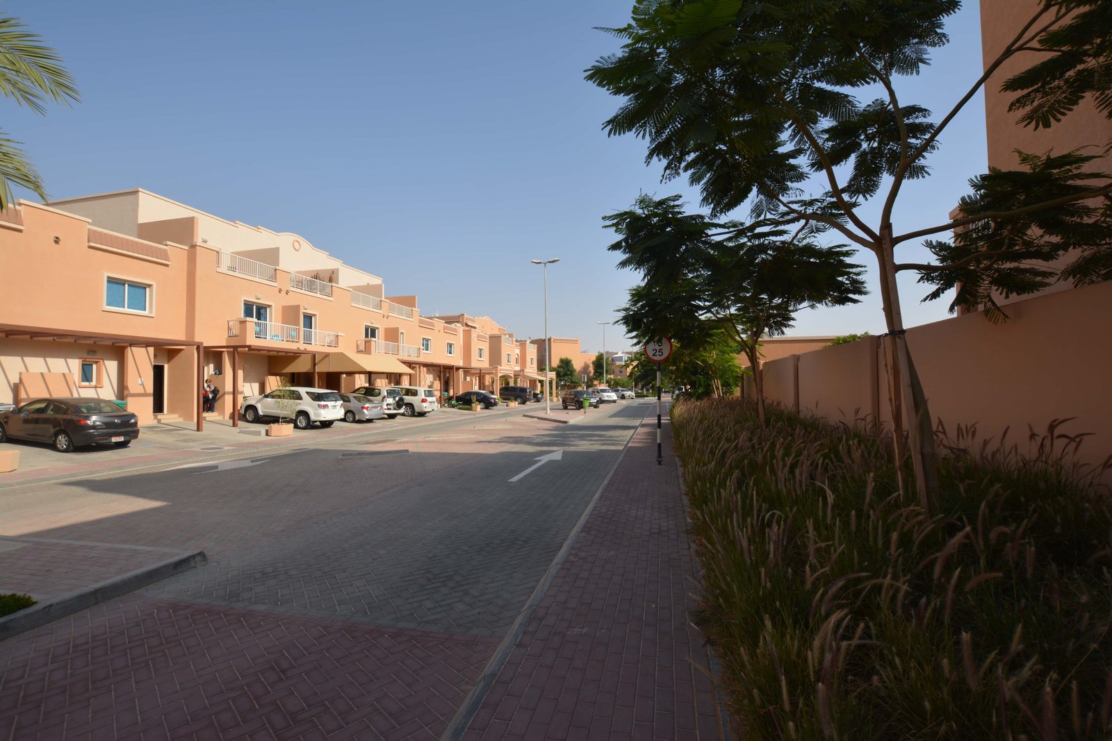 Spacious living room interior of Al Reef Mediterranean Villas Abu Dhabi with open-plan layout, natural light, and modern finishes.